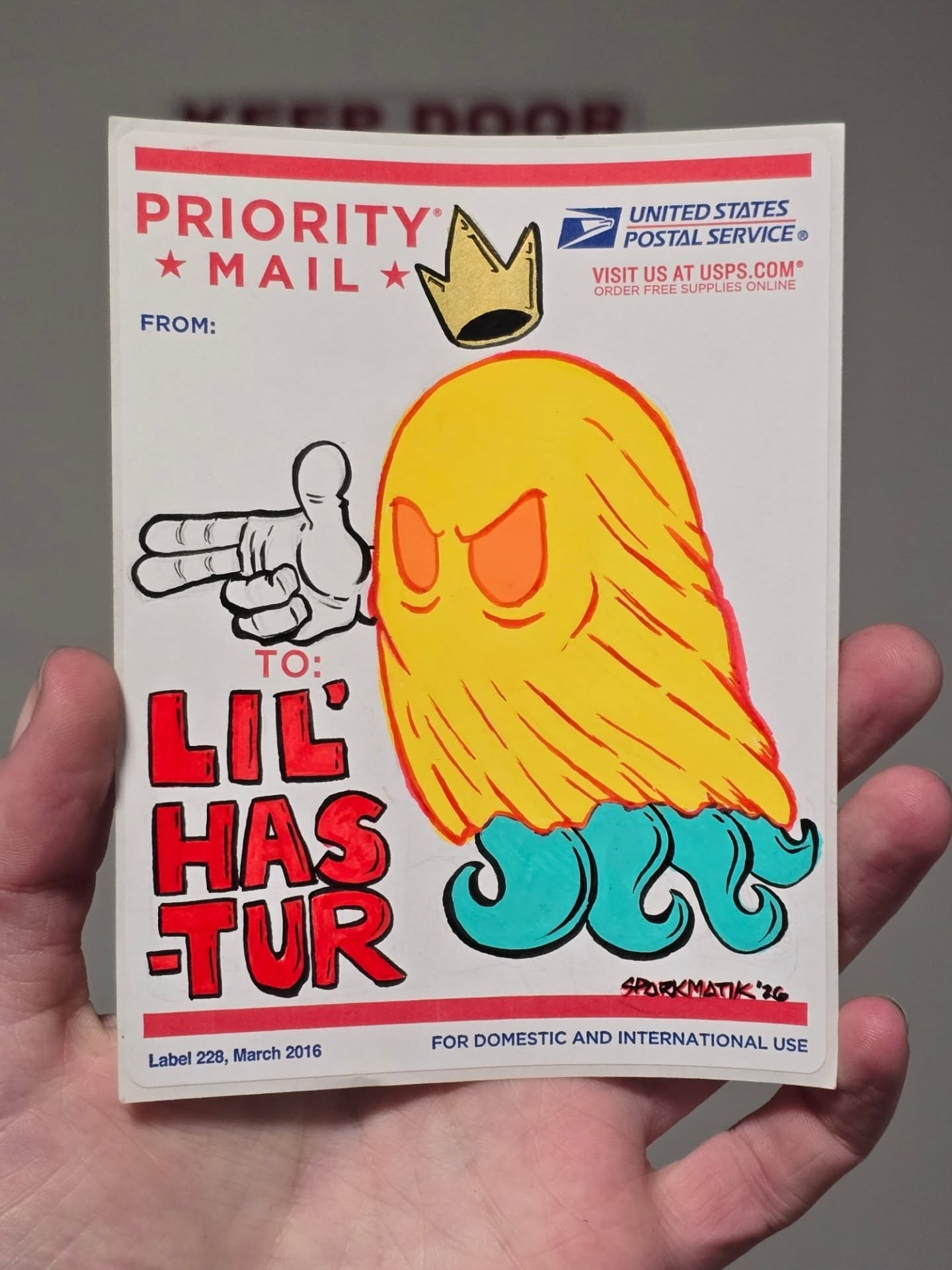 Hand-painted postal label sticker of a yellow tentacled ghost king wearing a gold crown, with LIL HASTUR lettered in red.